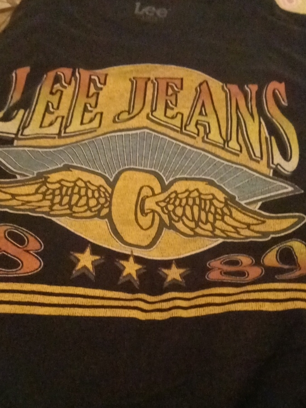 Lee Black Graphic Tee with Yellow, Blue & Red Accents